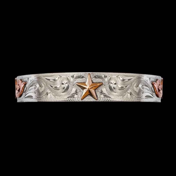 The George Western Cuff Bracelet will add a touch of Western Style to any outfit. Features a hand engraved base on  natural finish german silver base with copper scrolls and a bronze golden star. Order it now!
